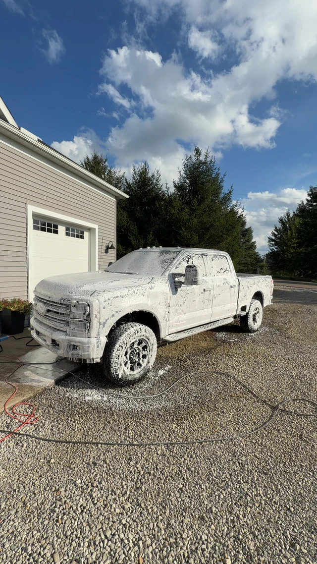 Pickup covered in foam during an exterior detail