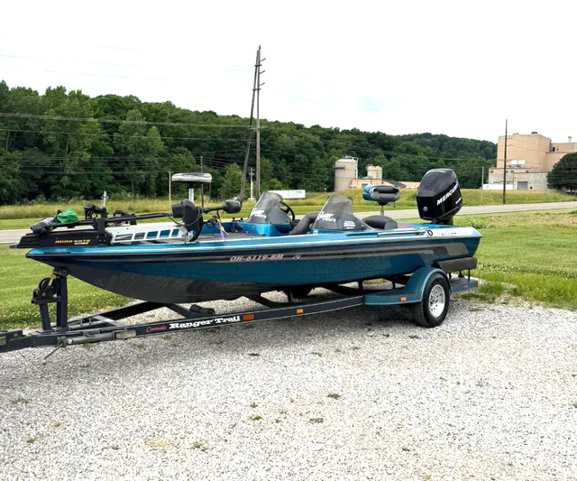 Detailed blue bass boat on its trailer