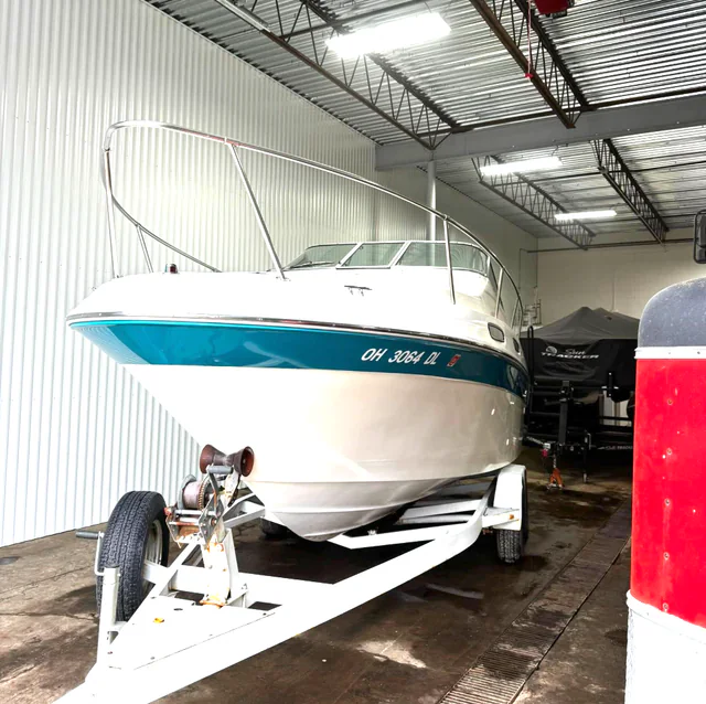 White and teal cruiser boat after detailing