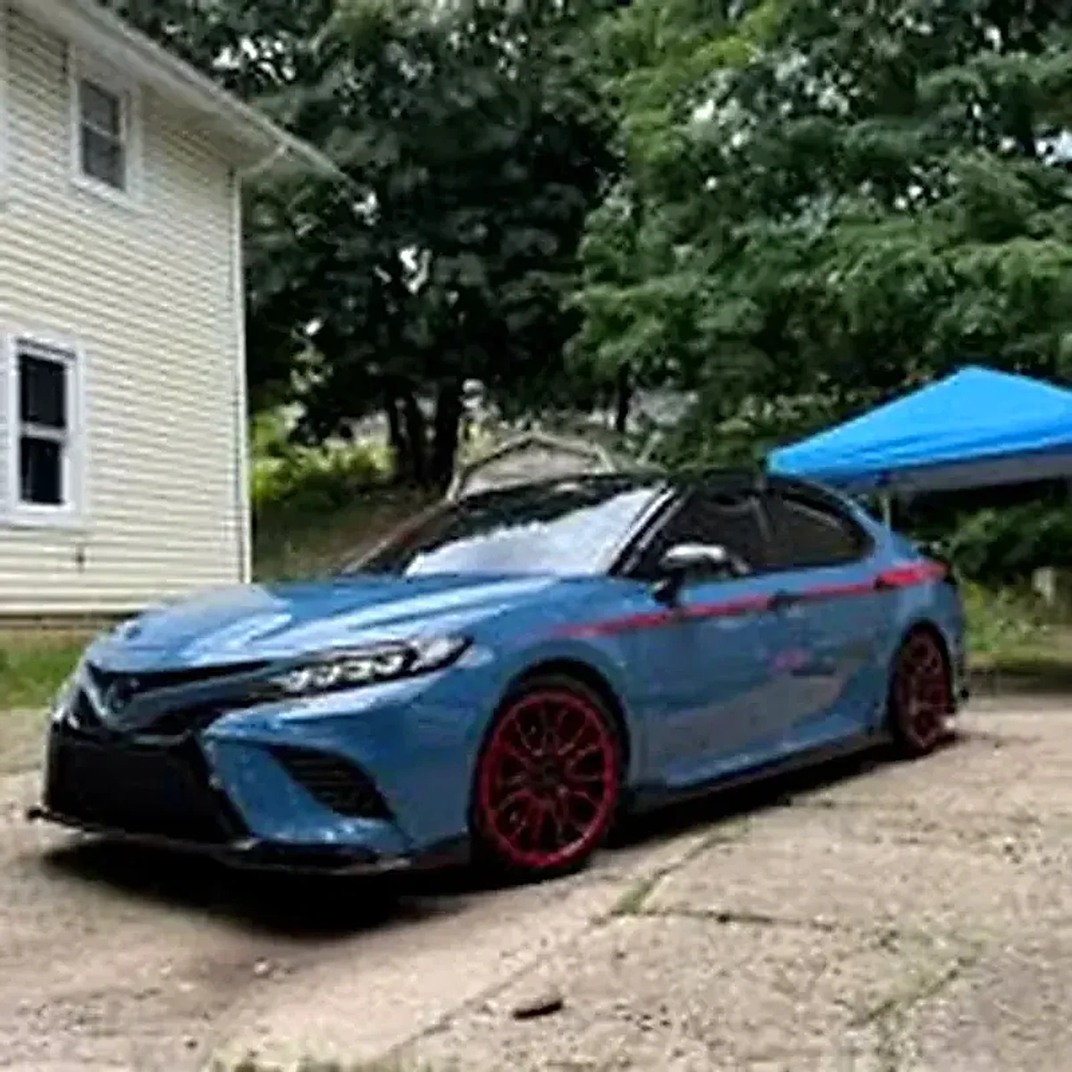 Blue detailed car with red wheels